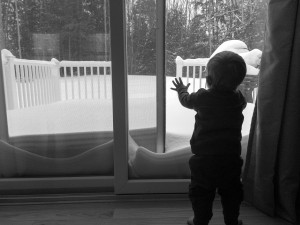 boy looking out window